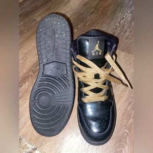 Sold!! Jordan 1 black and metallic gold